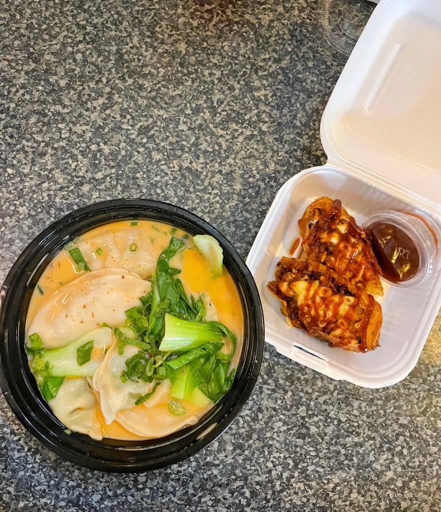 A bowl of ramen and egg rolls