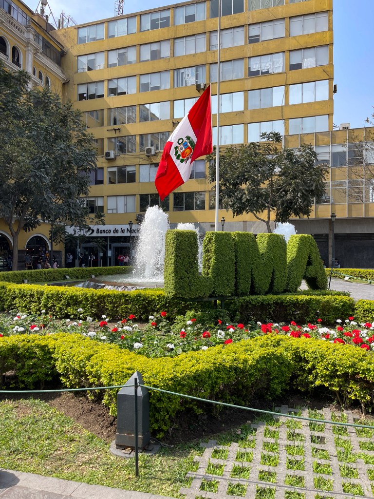 Greenery sign reading "Lima" in downtown Lima, Peru