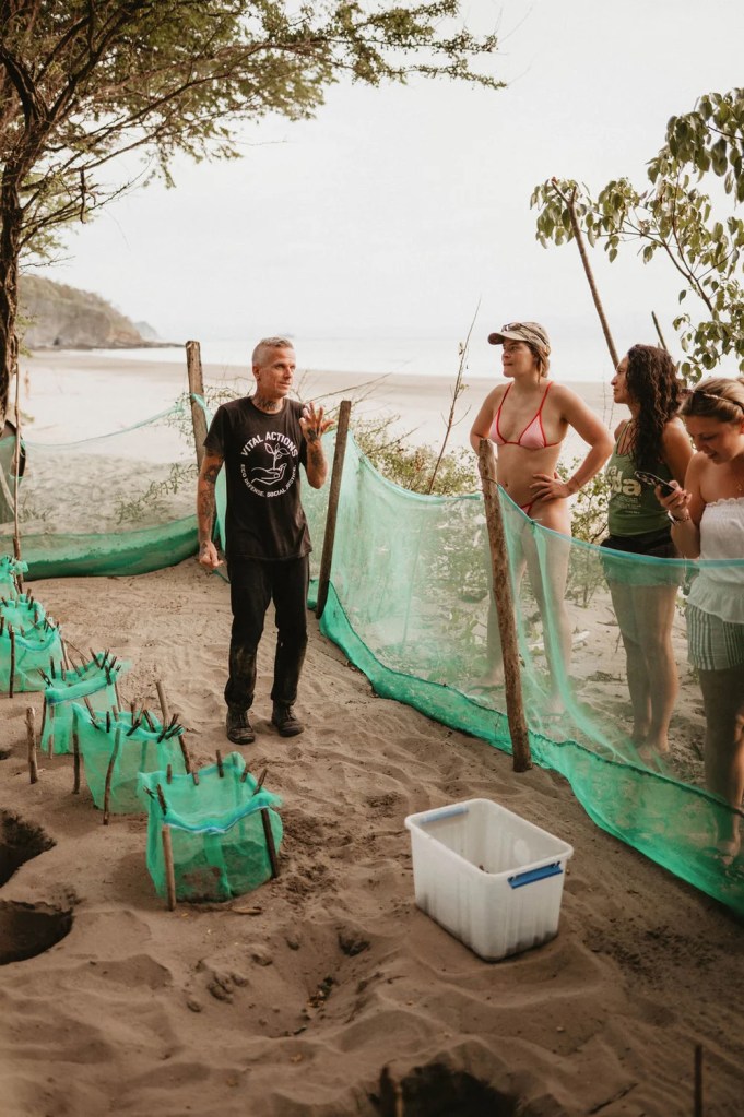 Tim, the founder of Vital Actions, explaining what will happen during a sea turtle release